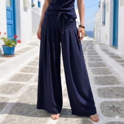 Χειροποίητη palazzo παντελόνα NAVY BLUE PIETA PANTS από βισκόζ, ψηλόμεση με φαρδιά γραμμή και ρευστή πτώση. Κομψό και minimal καλοκαιρινό κομμάτι με διαχρονική αισθητική.
